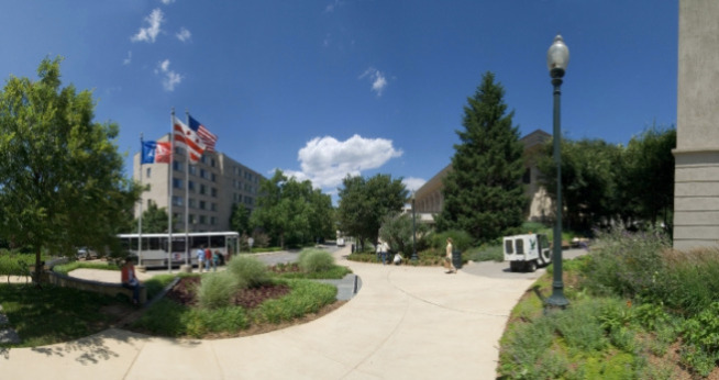 Photo of the shuttle driving through campus.